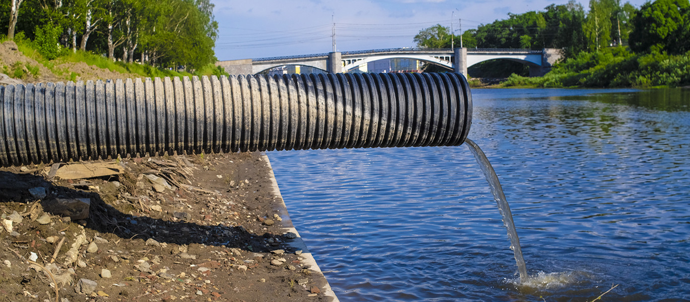 Sewage flows down to the river