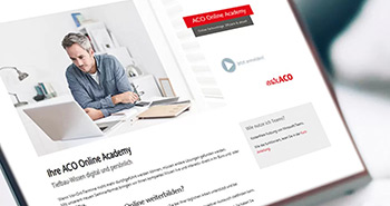 Geöffnetes Notepad, auf dem Bildschirm der Claim „ACO Online Academy“.